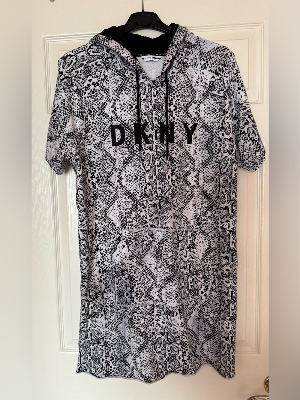 DKNY woman’s Black & White Snake Print Hoodie Dress.